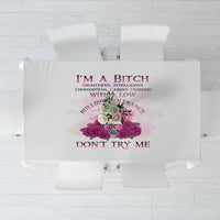 White tablecloth with centered multicolor rose and floral text design