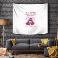 White wall tapestry with centered pink “I'M A BITCH” and “DON'T TRY ME” design