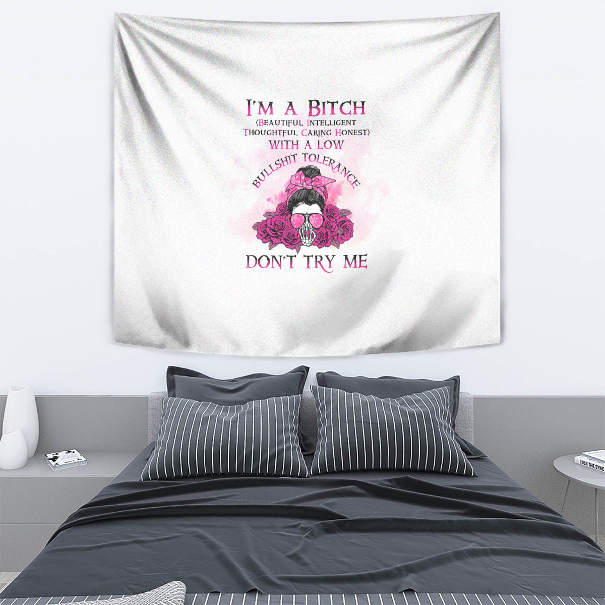 White tapestry with pink floral skull graphic and “DON'T TRY ME” text