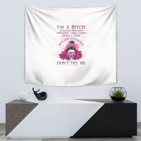 White tapestry hanging with pink floral skull illustration and “DON'T TRY ME” text