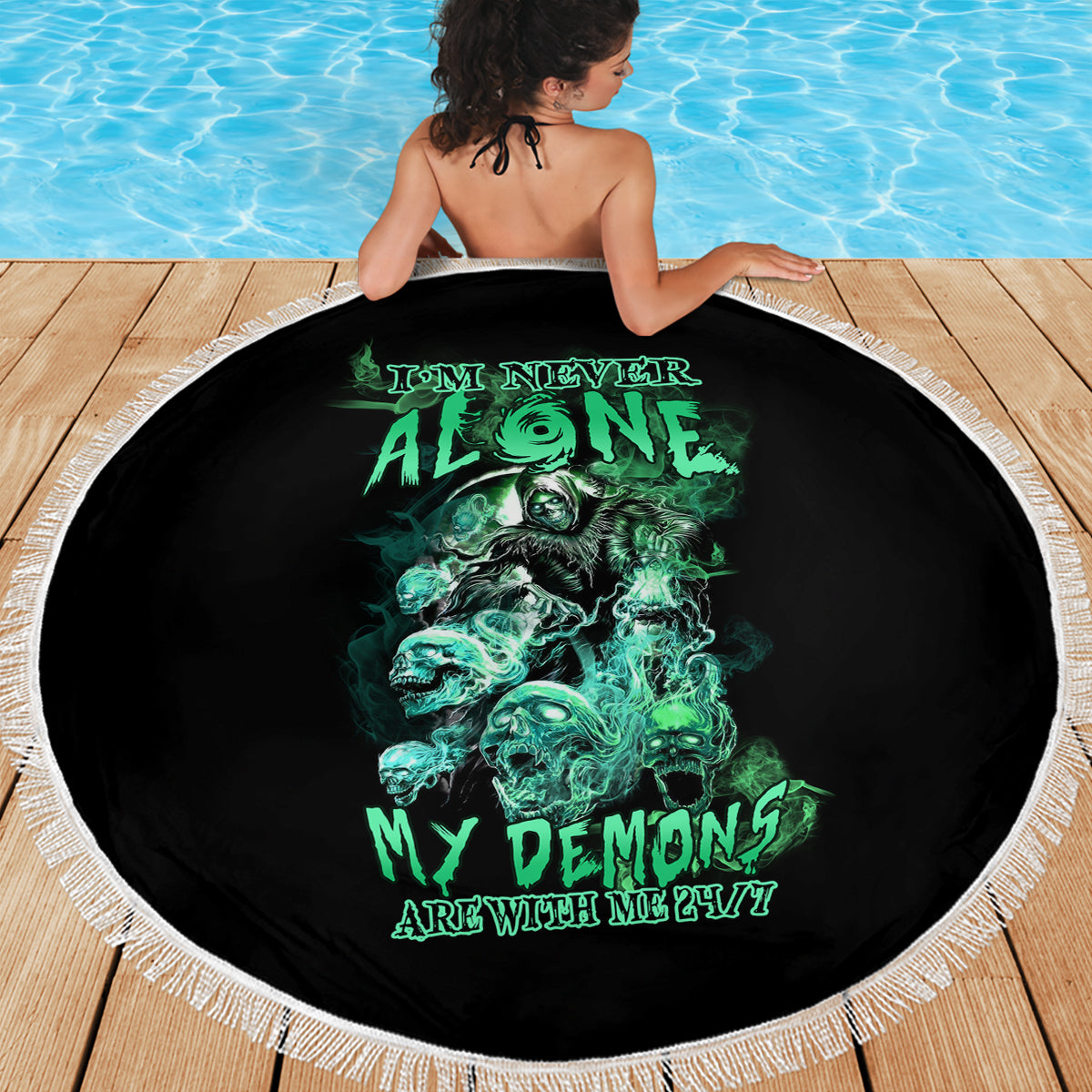 Round 150cm beach blanket, black with green reaper-skull graphic and white fringe edge