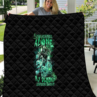 Black diamond-quilt throw with neon teal skull reaper print and title text