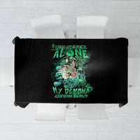 Black tablecloth with centered green skull reaper artwork and gothic text