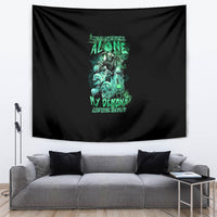 Black tapestry with teal-green skull reaper graphic and neon text accents