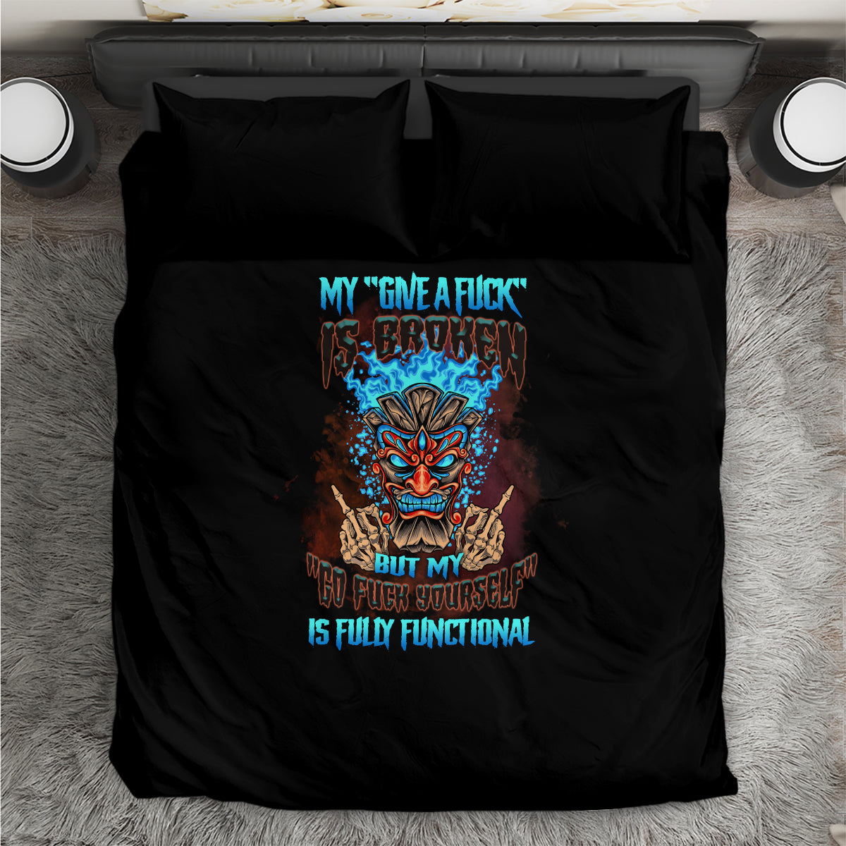 Black bedding set with centered skull graphic and two pillow shams