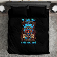 Black bedding set with centered skull graphic and two pillow shams