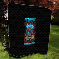 Black quilt with diamond stitching and colorful tiki skull graphic, rounded corner view