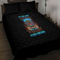 Black quilt bed set with colorful tiki skull graphic and two quilted pillows