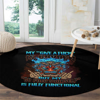 Black round carpet with tiki skull graphic and colorful slogan lettering