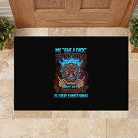 Black rubber doormat with centered tiki skull graphic and colorful slogan