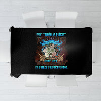 Square black tablecloth showing a colorful skull Tiki style print