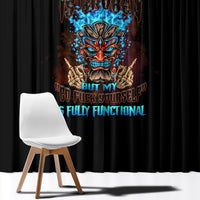 Black window curtain panel with multicolor tiki skull graphic and vivid blue lettering.