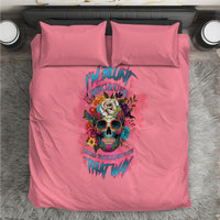 Pink bedding set with duvet and two pillows, featuring colorful skull and rose graphic