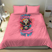Pink bedding set with duvet and two pillows, colorful skull with rose and floral accents