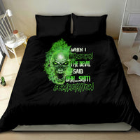 Black bedding set with green neon skull face and text on duvet and matching pillows