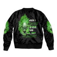 Black bomber jacket with large green skull back graphic and printed text