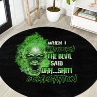 Black round carpet with green skull face and bold neon text design