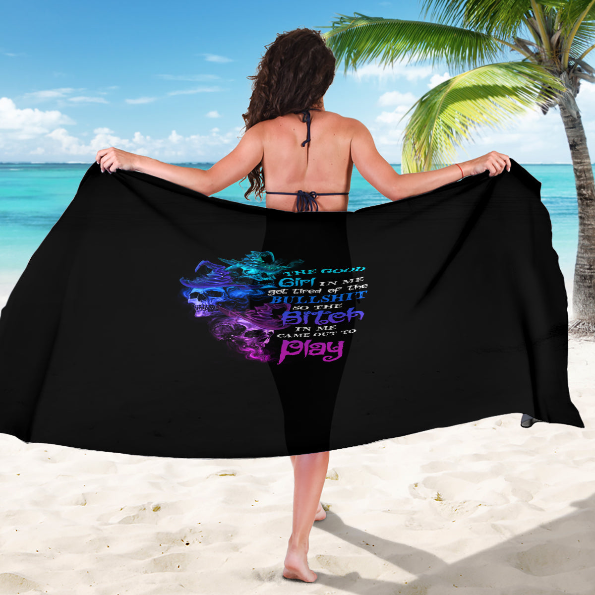 Black Halloween sarong with multicolor skull and witch-style lettering graphic, wide drape