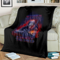 Black blanket with large skull-and-rifle graphic in red, blue, and orange