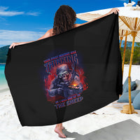 Black sarong with central colorful skull-style graphic print, spread wide