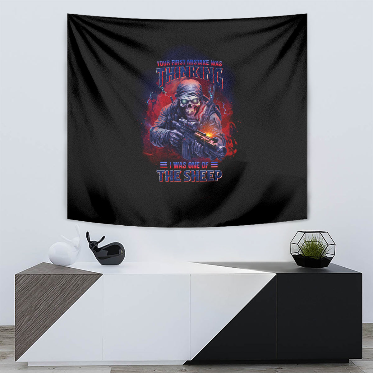 Black tapestry with skull holding rifle and bold multicolor text design in center
