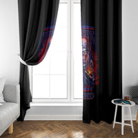 Black window curtain panels with multicolor character print framing a white door