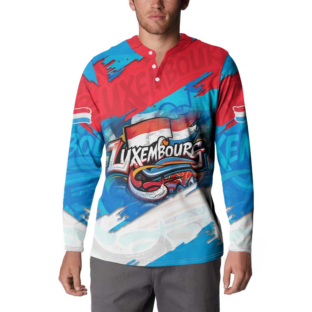 Button-front sweatshirt with Luxembourg graffiti emblem, red-and-blue panels