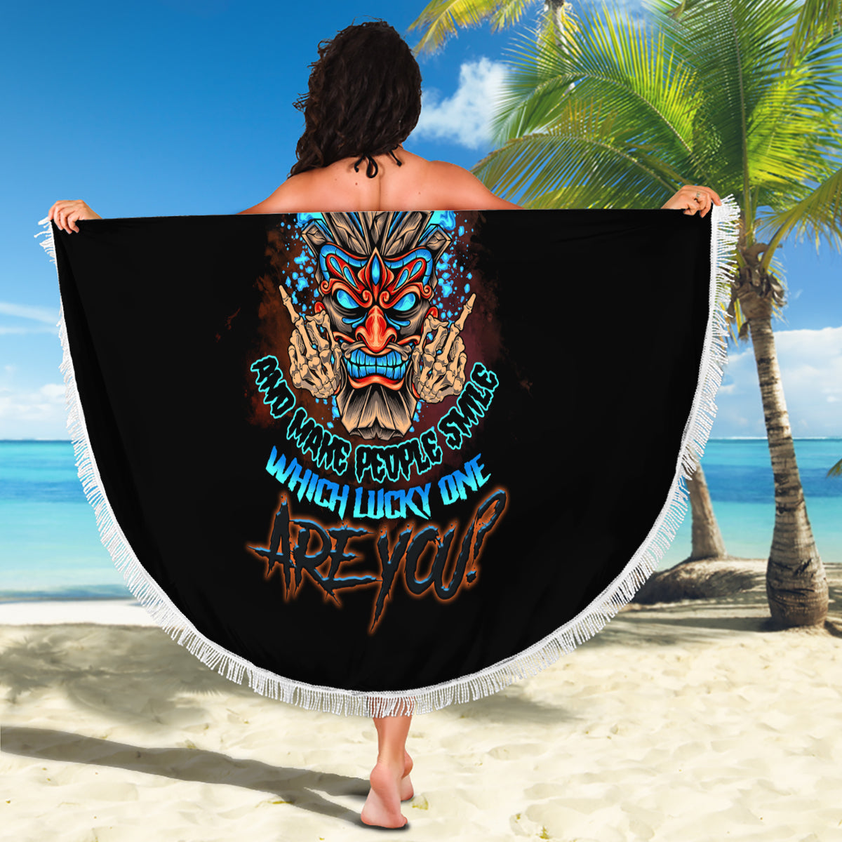 Round black beach blanket with white fringe and colorful tiki skull centerpiece