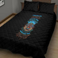 Black quilt bed set with diamond quilting and colorful skull-tiki graphic on front