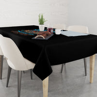 Black tiki skull tablecloth with multicolor graphic at center
