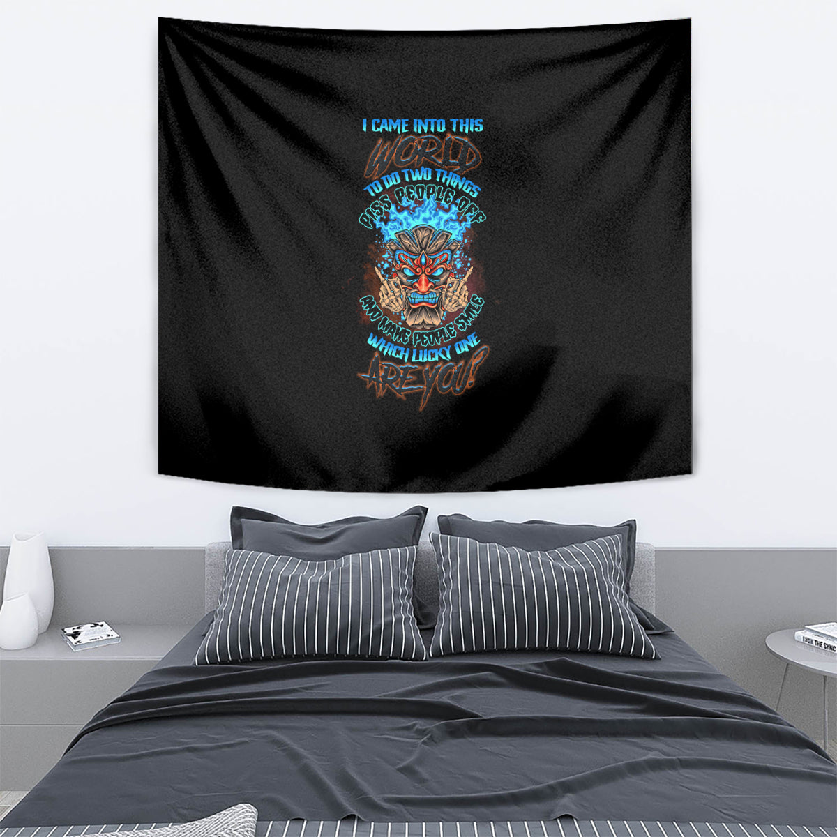 Black skull tiki tapestry with multicolor text graphic, rectangular wall hanging