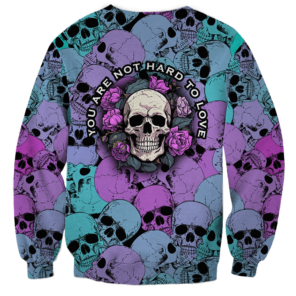 Multicolor skull and rose print sweatshirt with circular slogan graphic on chest