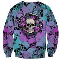 Multicolor skull and rose print sweatshirt with circular slogan graphic on chest