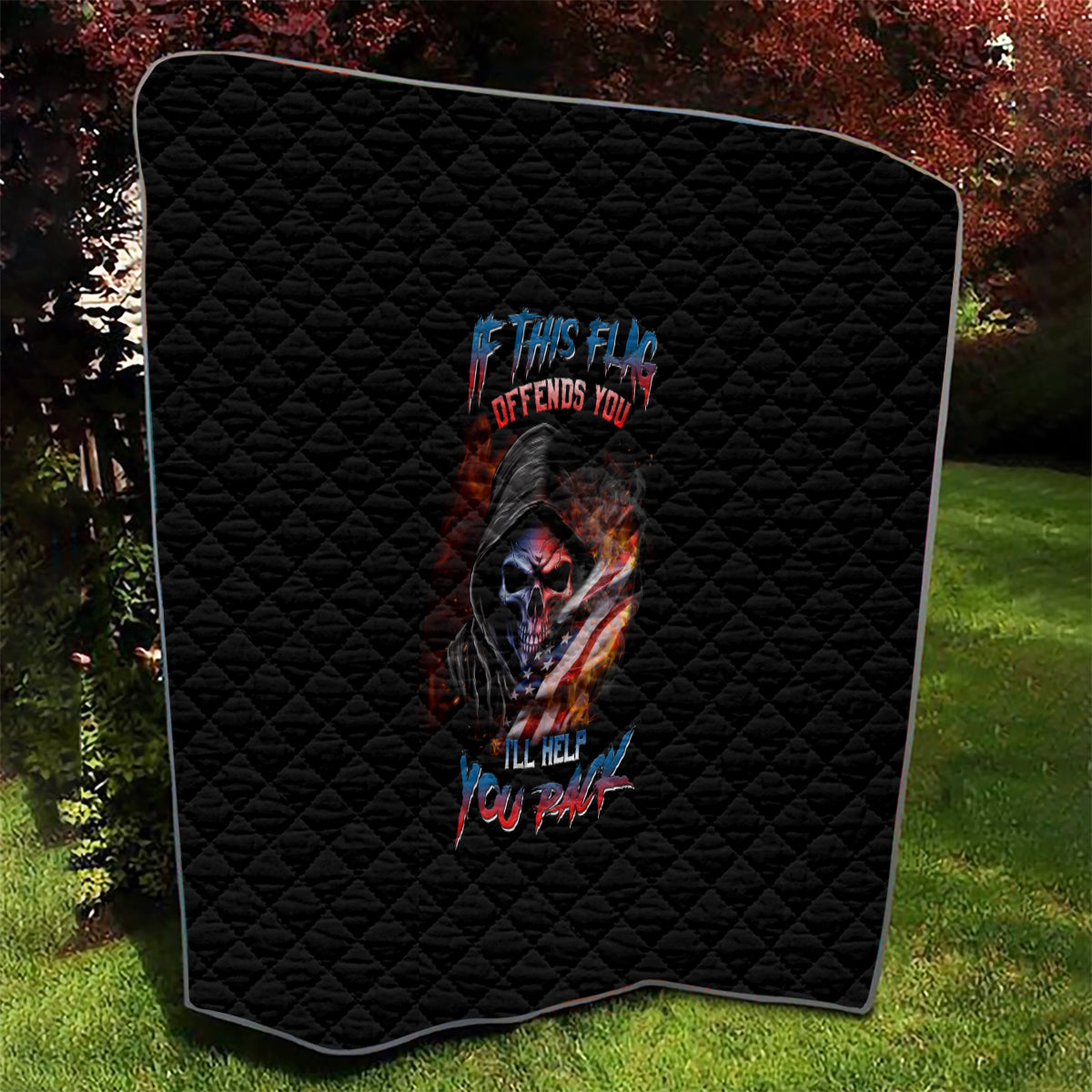 Black quilt with rounded corners, diamond stitching, and fiery skull graphic