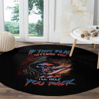 Black round rug with skull, flag streaks, and red/blue text graphic under a side table