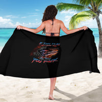 Black skull graphic sarong with colorful text, draped wide across body