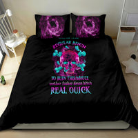 Black comforter set with central purple skull graphic and two purple pillowcases