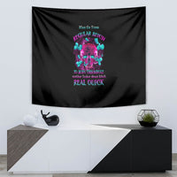 Black hanging tapestry with colorful skull artwork and layered quote text