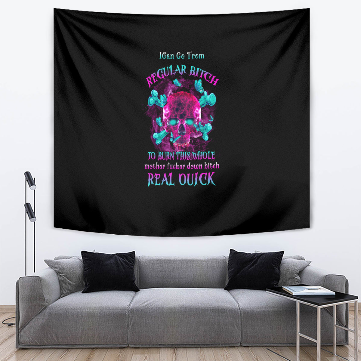 Black tapestry wall hanging with neon-style skull graphic and phrase text