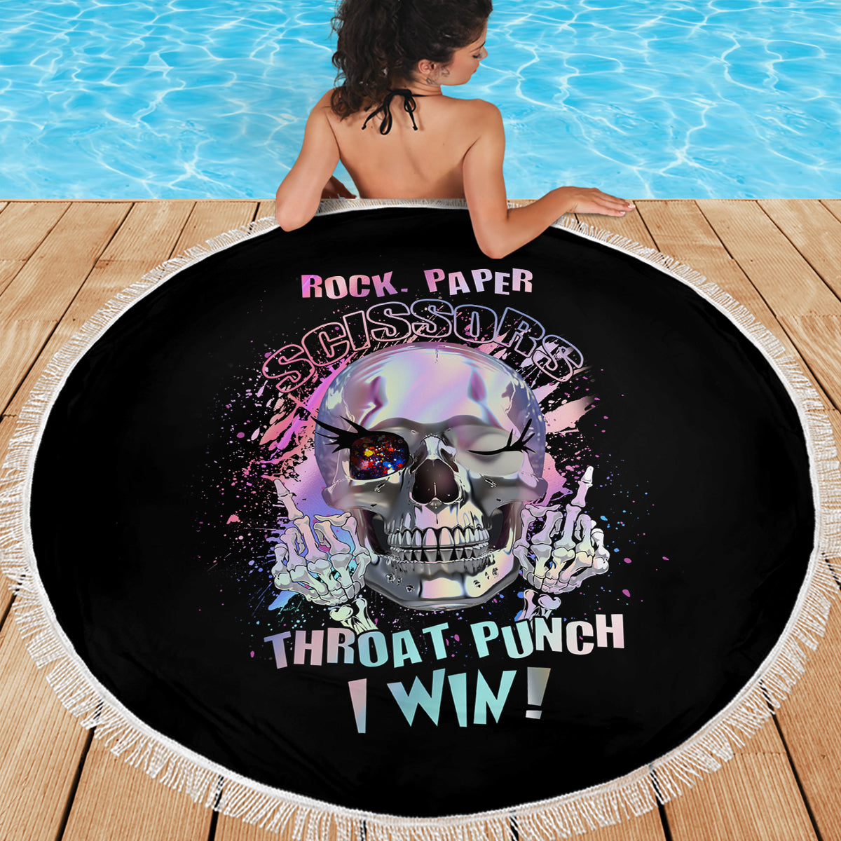 Round beach blanket, black skull artwork with 'Throat Punch I Win' lettering, fringed edge
