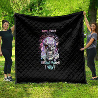 Black quilted throw blanket with colorful skull graphic and stylized text
