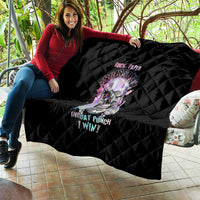 Black quilted throw blanket with skull graphic and bold multicolor text