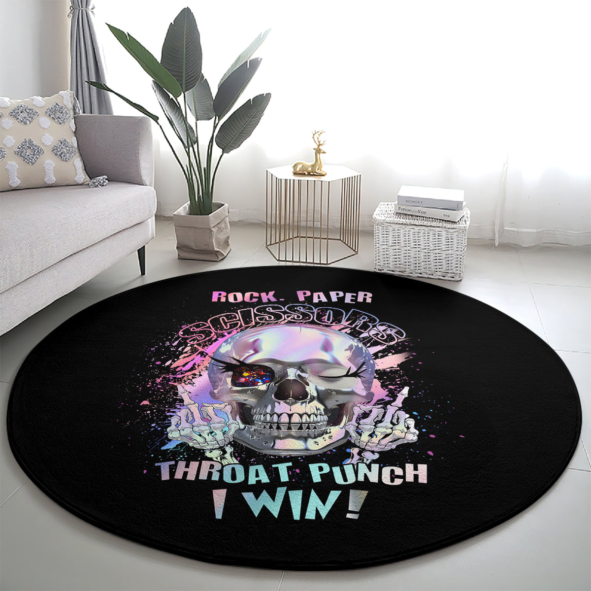 Round black graphic carpet rug with skull and “ROCK PAPER SCISSORS” text
