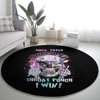 Round black graphic carpet rug with skull and “ROCK PAPER SCISSORS” text