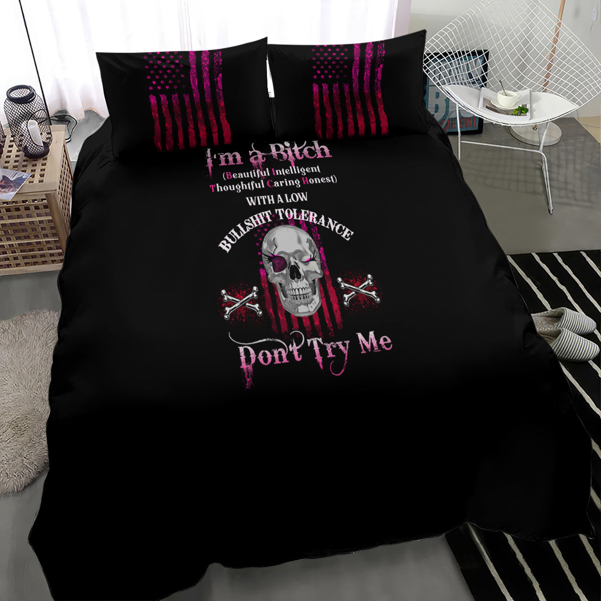 Black duvet cover set with skull graphic, purple/red accents, and two square pillows