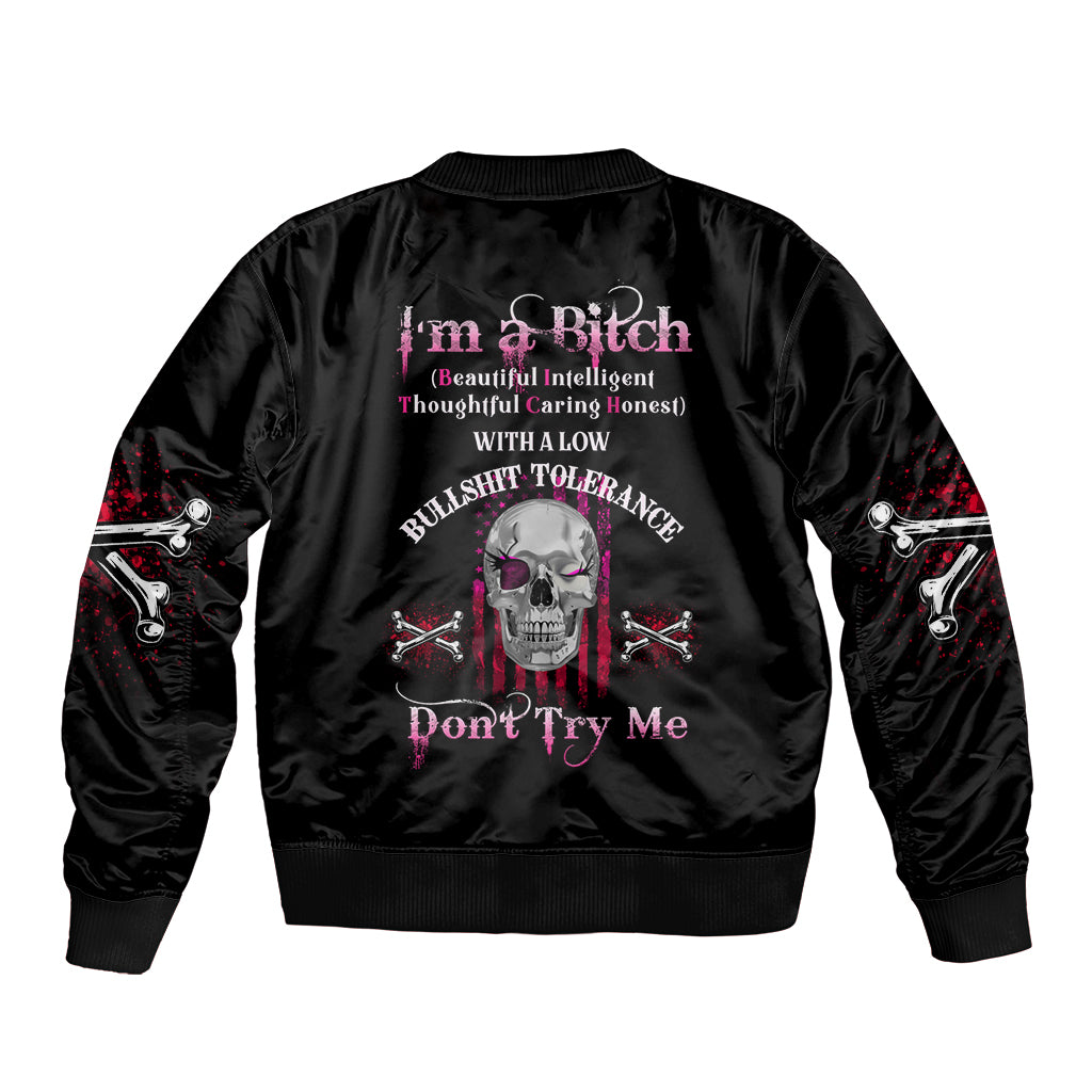Black satin bomber jacket with back skull graphic and text, ribbed collar and cuffs.