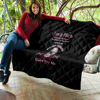 Black quilt with diamond quilting, skull graphic and 'Don't Try Me' text on couch