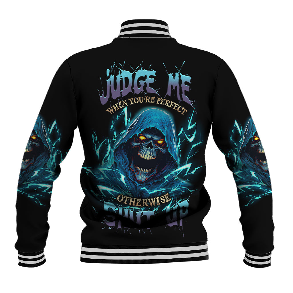 Black baseball jacket with blue skull graphic, striped ribbed collar and cuffs
