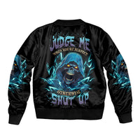 Black bomber jacket with blue skull-reaper graphic on back, ribbed cuffs and hem.