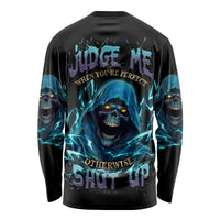 Black long-sleeve shirt with back skull graphic, blue lightning, and bold text print